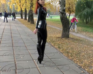 Fabulous gal in spandex catsuit and spandex balletboots