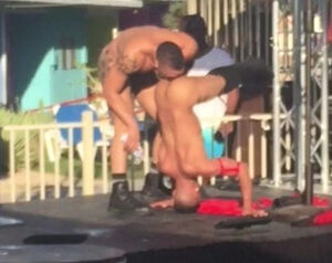 2 fag strippers smooch and eat each other at outdoor soiree
