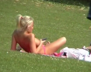 Immense knockers honey bare-chested in public lawn