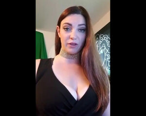 Lengthy haired huge-chested woman praises dark-hued