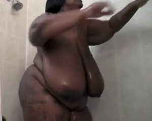 This Fat ebony damsel wanks in the shower. Her ginormous
